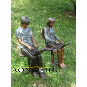 RG1483 Four Kids Holding Hands 01b bronze statue
